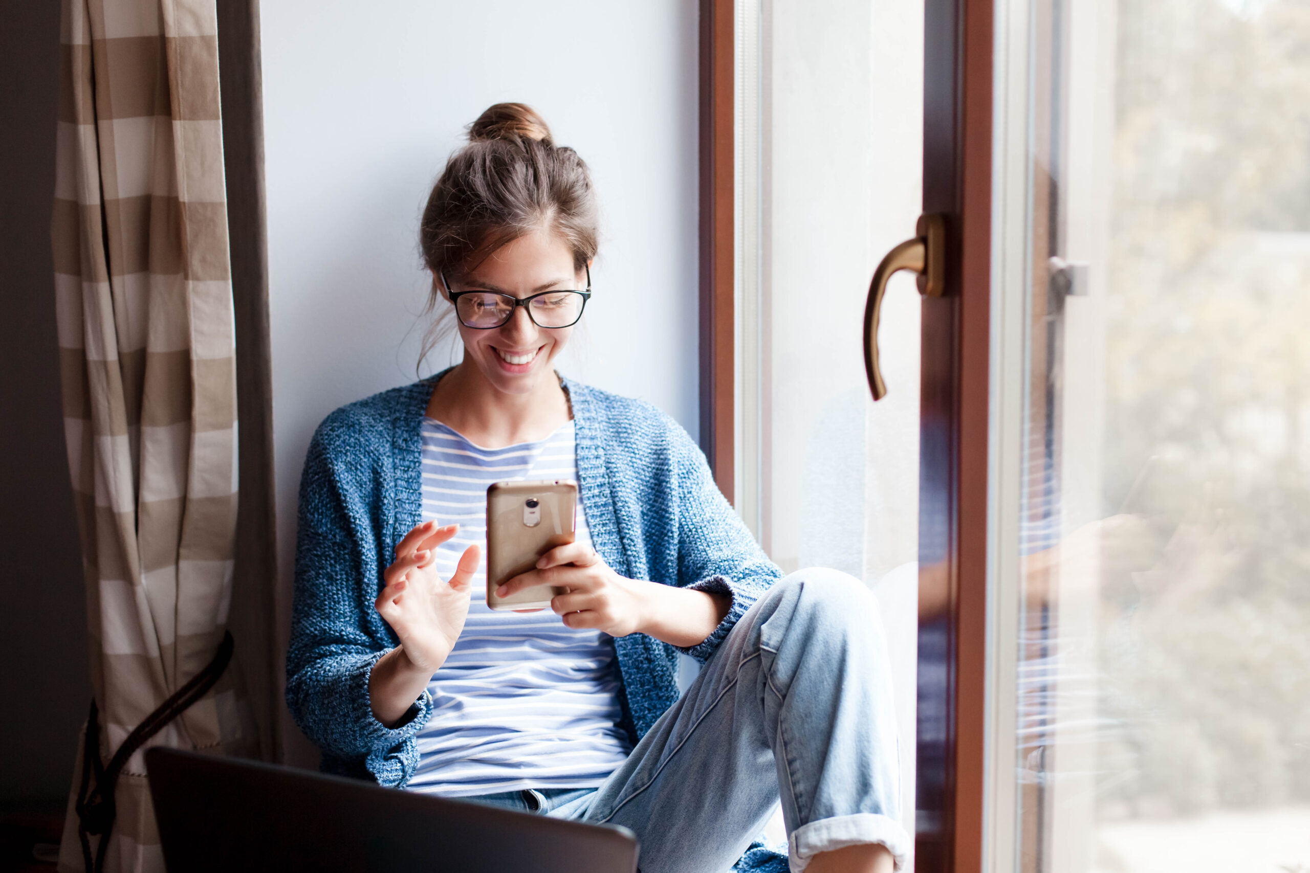 Holiday shopping online. Young woman makes purchases in the Internet. 