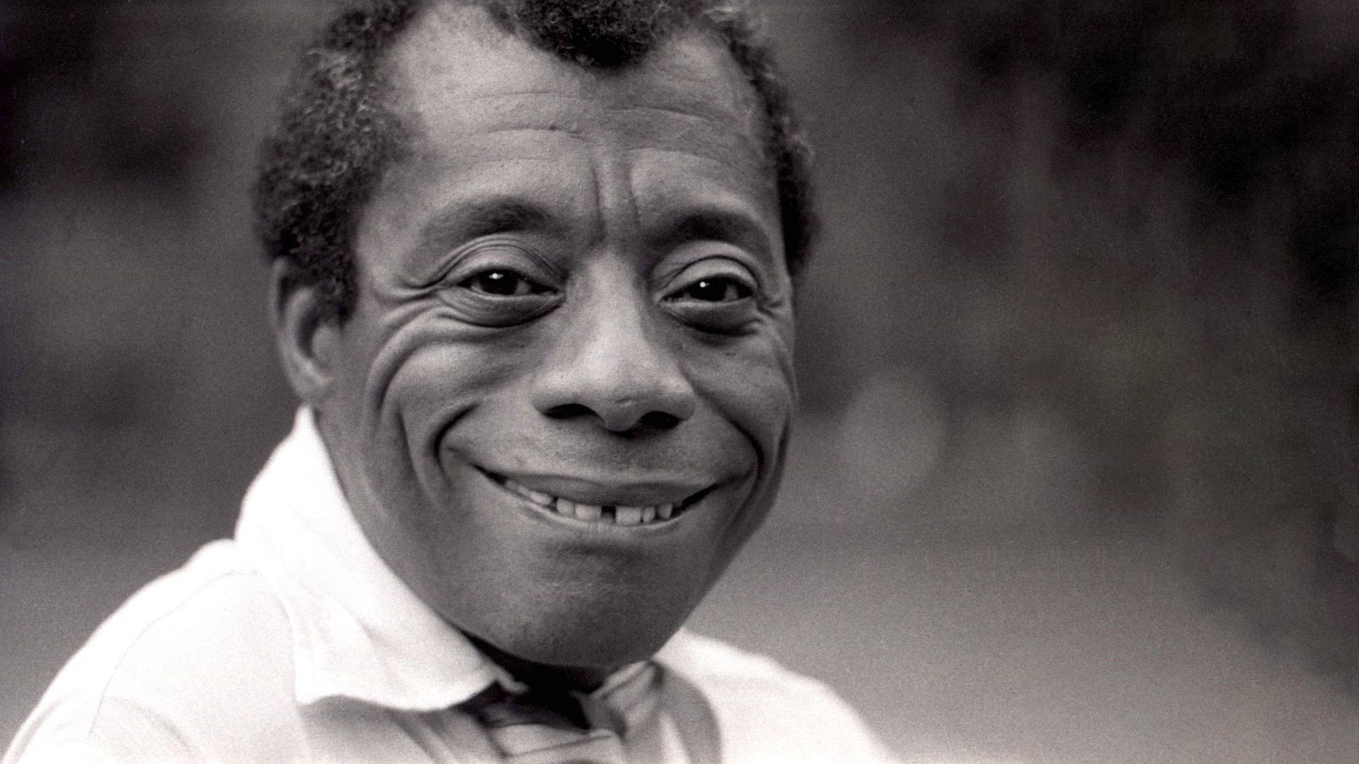 James Baldwin smiling