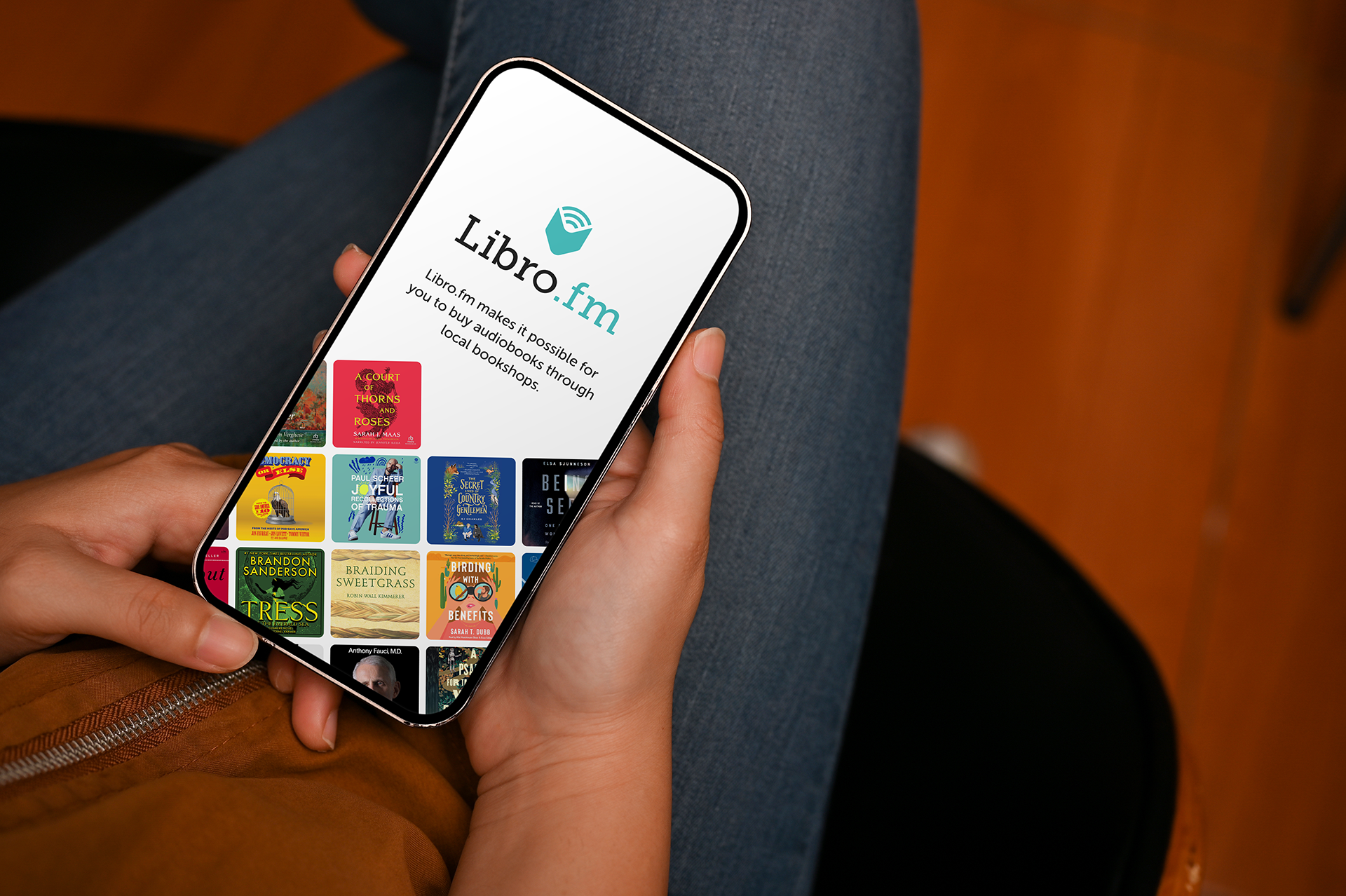 Person holding Libro.fm app