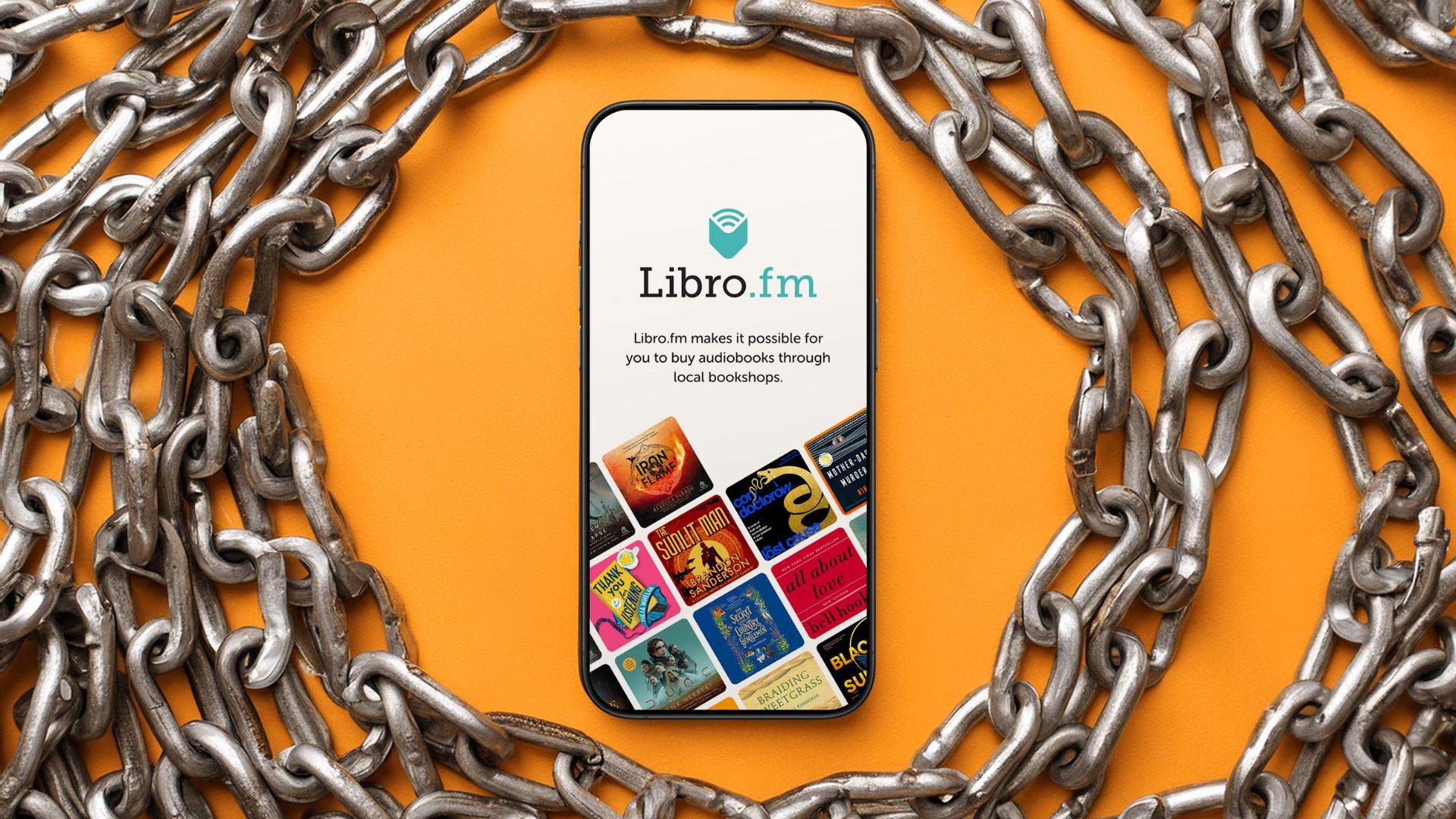 Libro.fm on an iPhone surrounded by chains